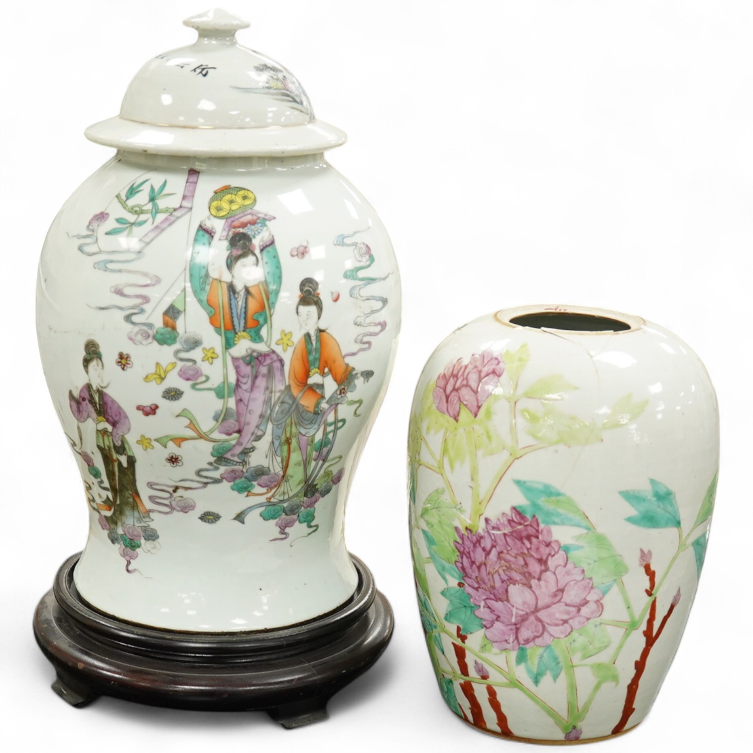 A Chinese famille rose vase and cover on stand, a smaller famille rose vase, vase and cover 50 cm high including stand., Condition - smaller vase in pieces and reglued.